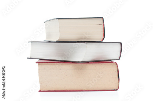 Stack of books close up isolated on white background