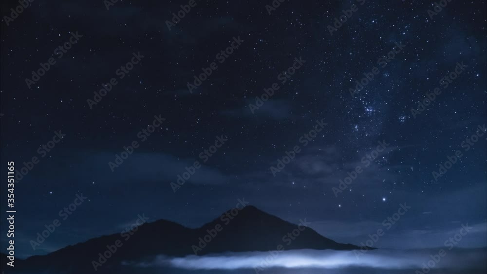 starry sky on the island of Bali, mountain and clouds, timelapse starry sky on the island of Bali, mountain and clouds, timelapse