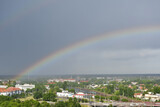 View of Debrecen city with rainbow, Hungary, after summer shower