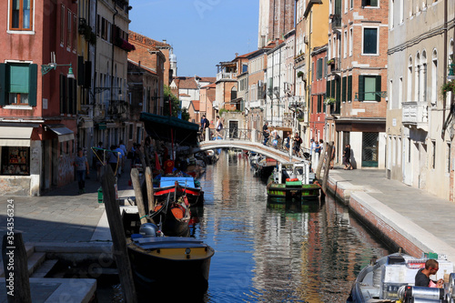 canal in Venice with bridge and sunny weather © Anastasia