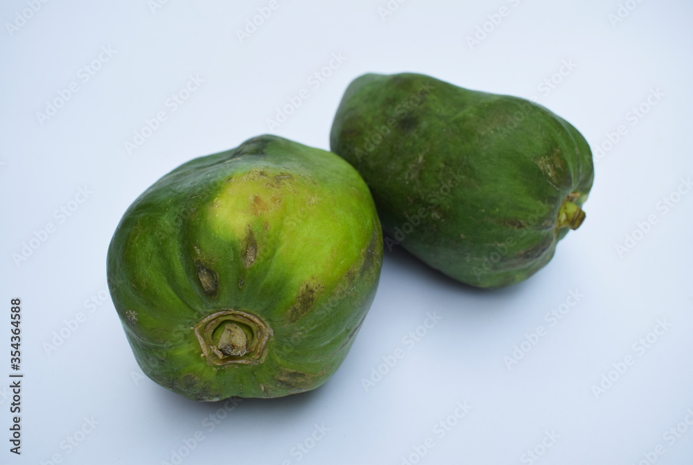 Green papaya, papaw or pawpaw or Raw papaya fruit Indian Mexico American Green papaya, papaw or pawpaw or Raw papaya fruit Indian Mexico American