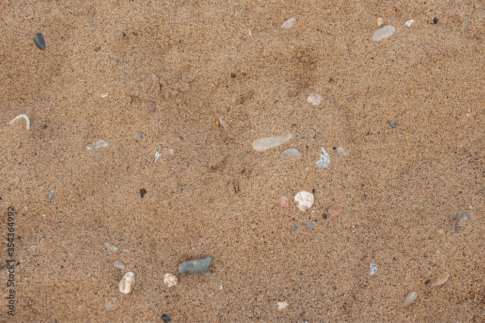 beach sand, stones, and pebbles background horizontal beach sand, stones, and pebbles background horizontal