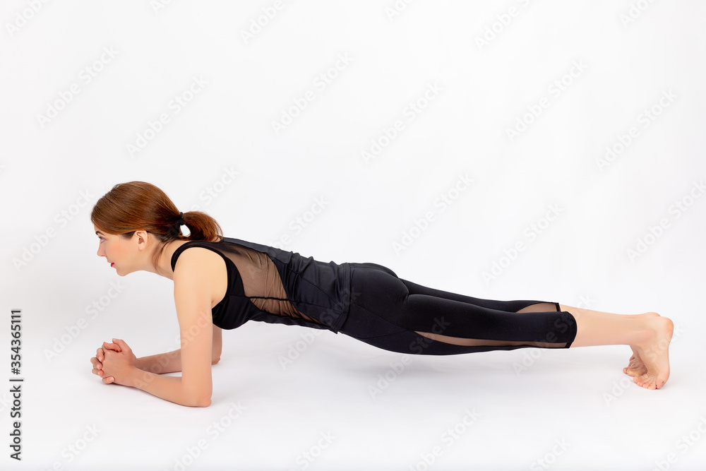 girl doing sports on a white background, healthy lifestyle, standing in the bar, weight loss, space for text girl doing sports on a white background, healthy lifestyle, standing in the bar, weight loss, space for text