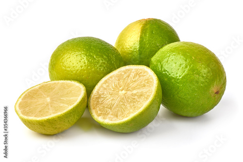 Fresh lime fruit with lime slice, isolated on white background