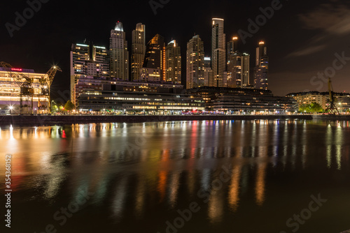 Night view of Puerto Madero, in Buenos Aires with the reflection of the lights in the water