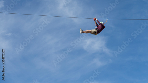 People on the mountains enjoying a zip line in La Rumorosa, Baja California. MEXICO, Extreme sports concept