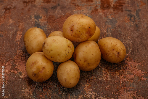 Raw baby young potato heap