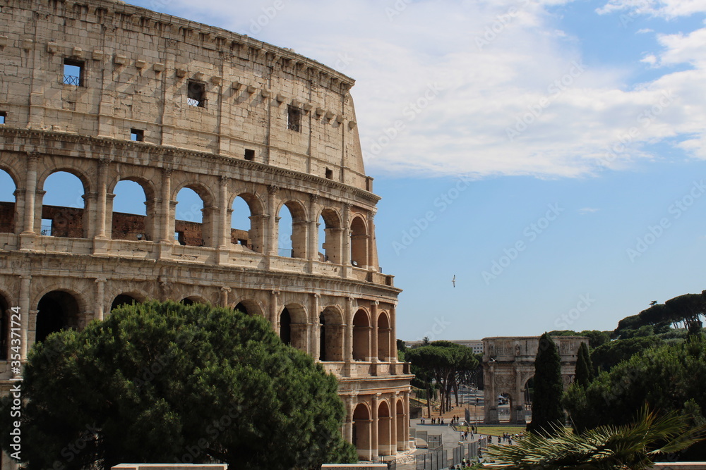 Naklejka premium colosseum in rome italy Colosseum in rome is among wonders of world and famous tourist destination and ancient amphitheater once used for gladiator fight 