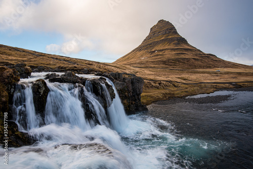 Kirkjufell mountain and the kirkjufellfoss waterfall in Iceland