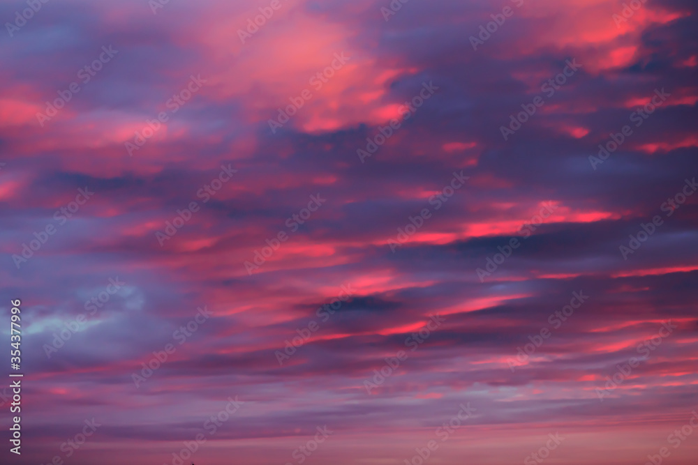 Beautiful sky background in raspberry color