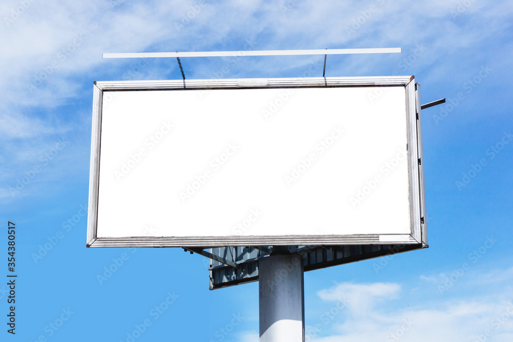 Blank billboard background. Cloudy blue sky advertisment texture. Empty copy space poster signpost panel. Street banner by the road. Blank billboard background. Cloudy blue sky advertisment texture. Empty copy space poster signpost panel. Street banner by the road.