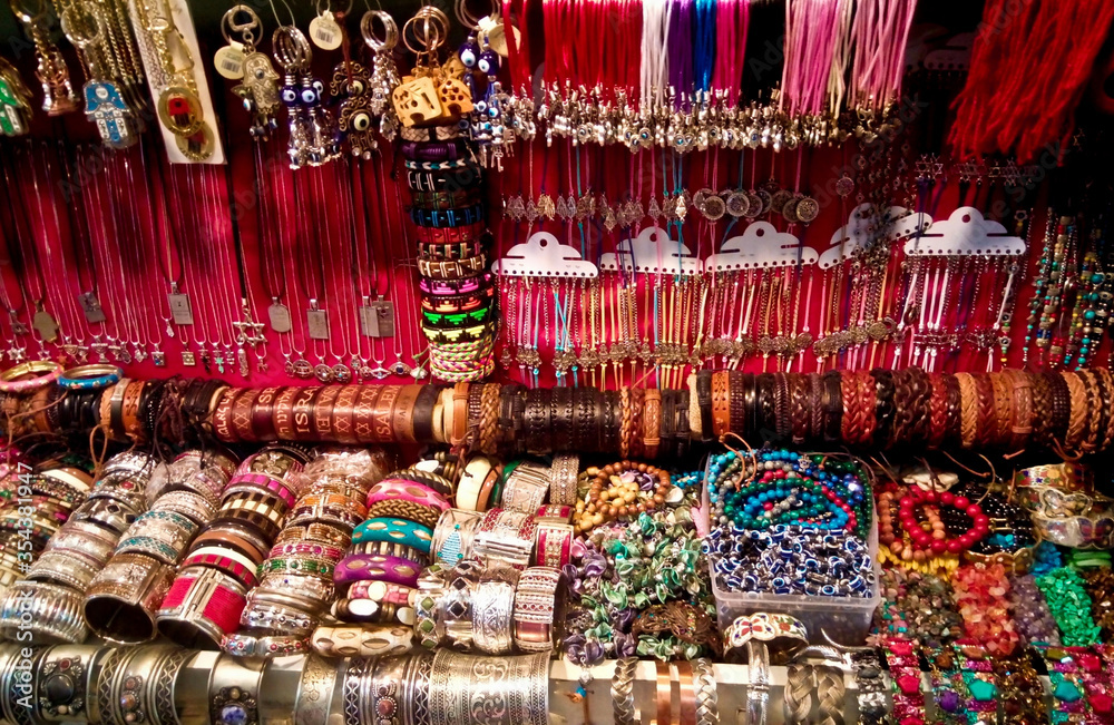 Close-up of market stall selling traditional jewelry in Jerusalem. Vibrant and appealing colors