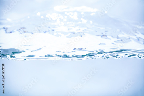 water splash on white background © suppakorn