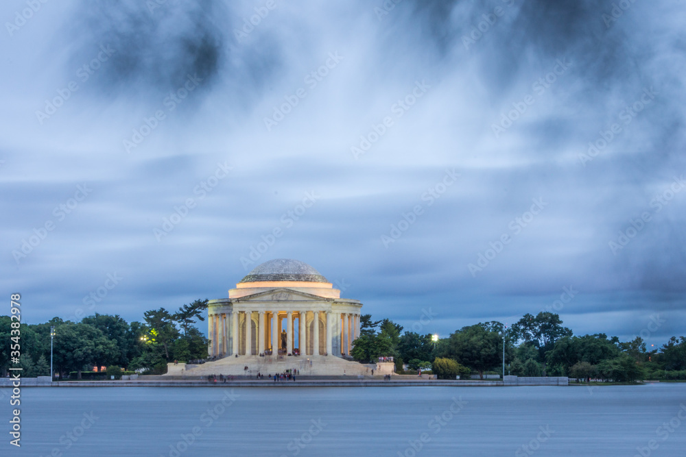 Jefferson Memorial in Washington D.C. with blurred tree leaves..