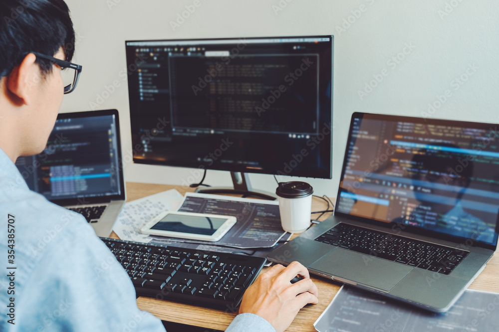 Developing programmer Development Website design and coding technologies working in software company office Developing programmer Development Website design and coding technologies working in software company office