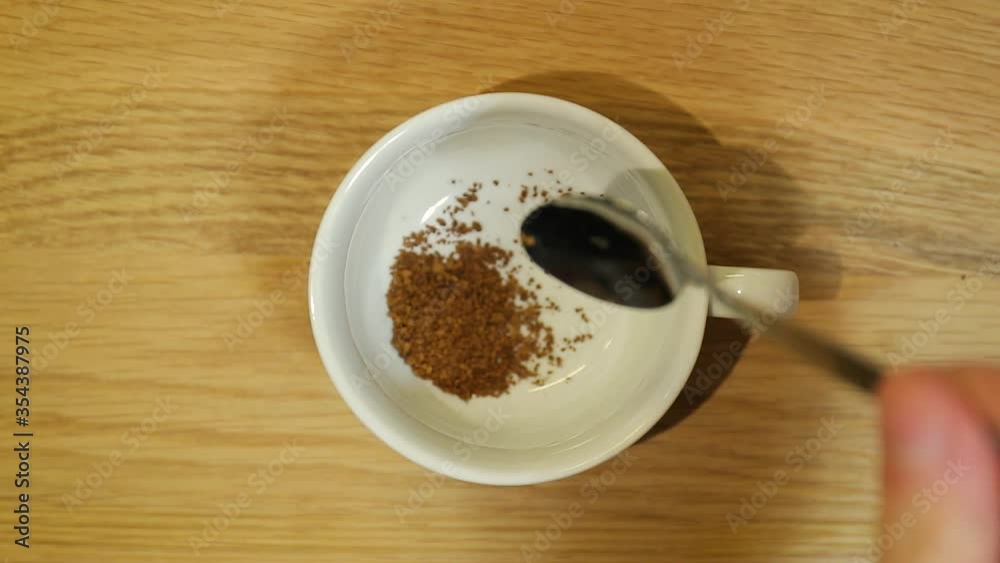 Making instant coffee, camrea lens fogging up with hot steam of boiling water, slow motion from 120 fps footage Making instant coffee, camrea lens fogging up with hot steam of boiling water, slow motion from 120 fps footage