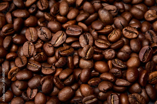 Roasted black coffee grains, can be used as background.