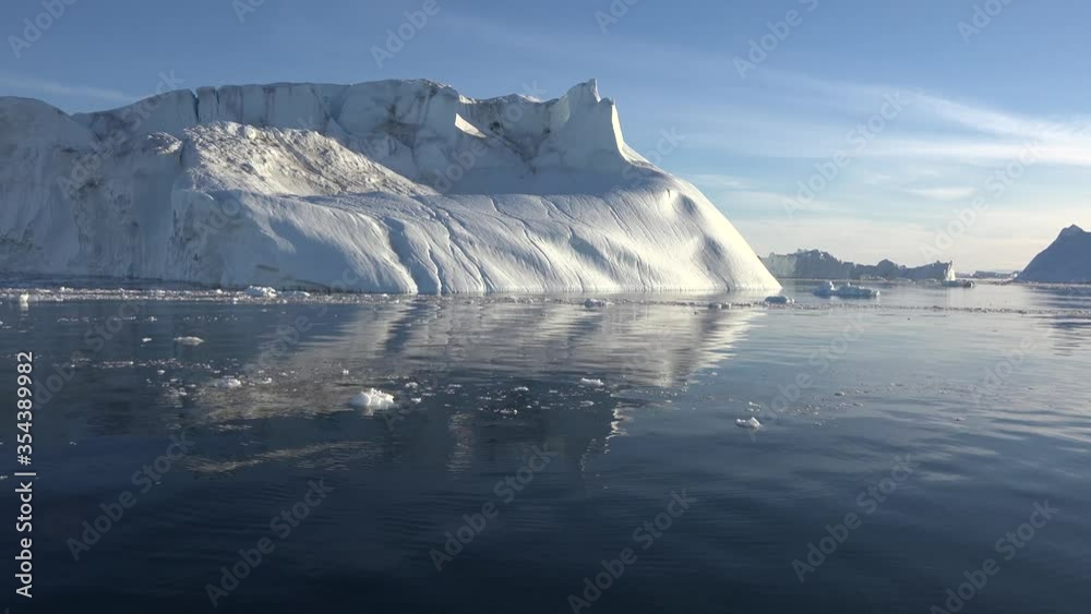 Iceberg. Climate change in nature leads to melting glaciers Iceberg. Climate change in nature leads to melting glaciers
