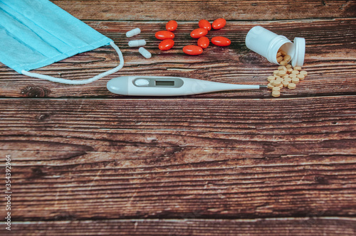 A Lot Of Different Drugs, Pills And Other Medicine On The Wooden Table