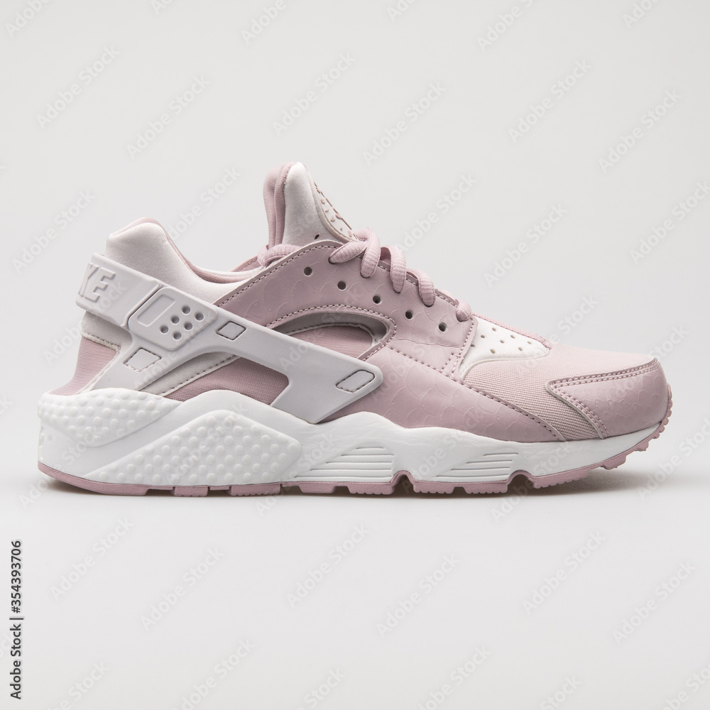 VIENNA, AUSTRIA - AUGUST 29, 2017: Nike Air Huarache Run rose, grey and  white sneaker on white background. Stock Photo | Adobe Stock