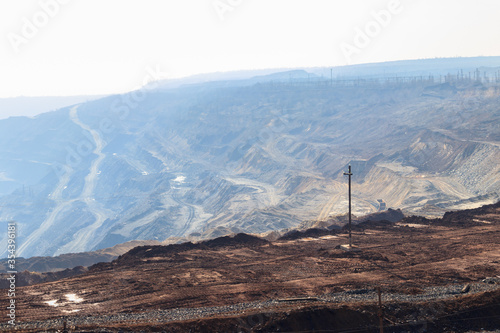 View of the iron ore quarry in morning haze