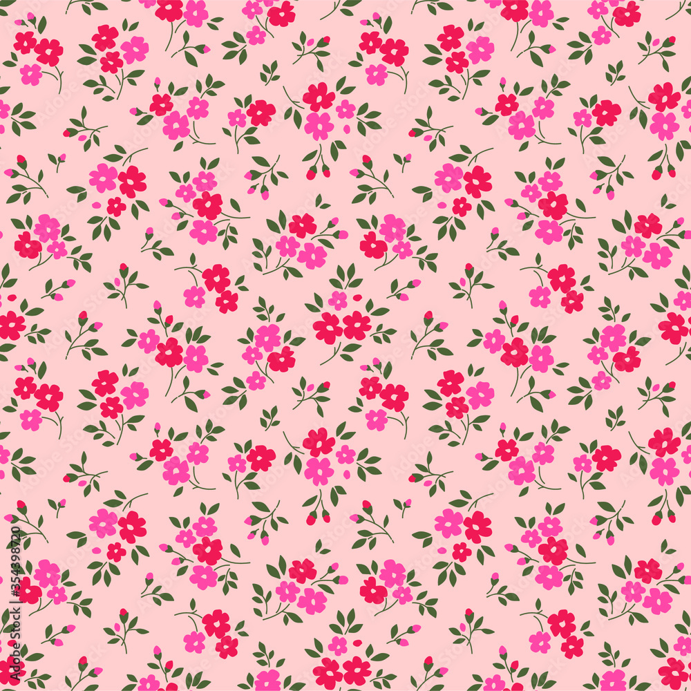 Vintage floral background. Seamless vector pattern for design and fashion prints. Flowers pattern with small pink and red flowers on a pale pink background. Ditsy style.