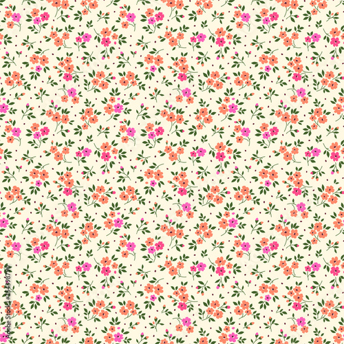 Simple cute pattern in small light orange flowers on beige background. Liberty style. Ditsy print. Floral seamless background. The elegant the template for fashion prints.