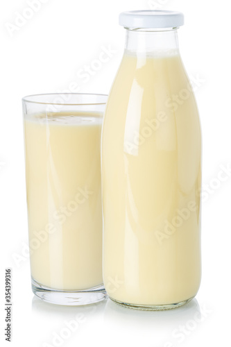 Milk drink milkshake shake in a bottle and glass isolated on white