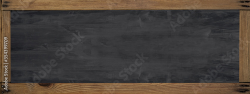 School background banner panorama - Empty blank old anthracite blackboard chalkboard texture with rustic wooden frame and space for text