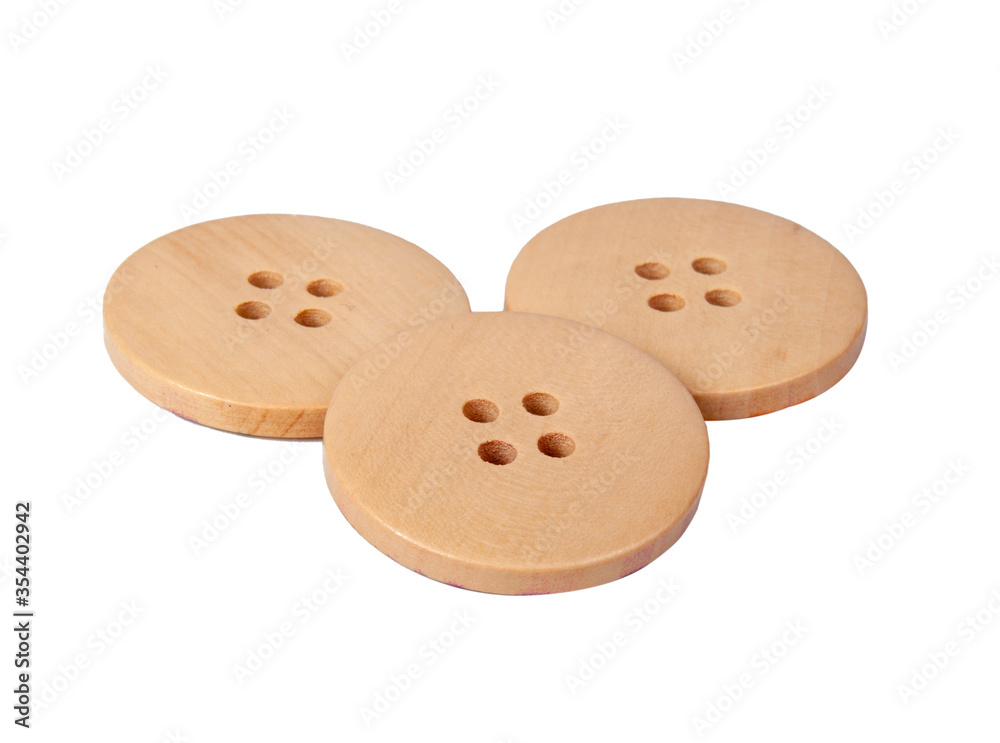 Fabric wooden button for cloth isolated on the white Fabric wooden button for cloth isolated on the white