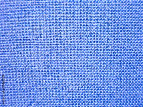 Natural fabric with a large weave as a texture for the background.