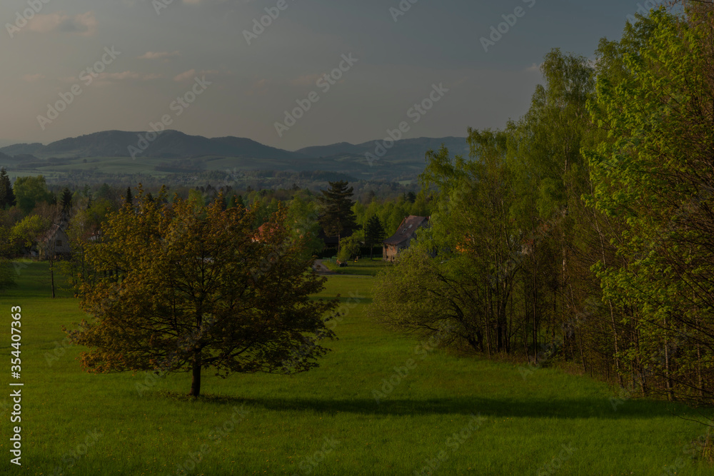 Color sunset with fresh meadows and old buidlings near Trojanovice village Color sunset with fresh meadows and old buidlings near Trojanovice village