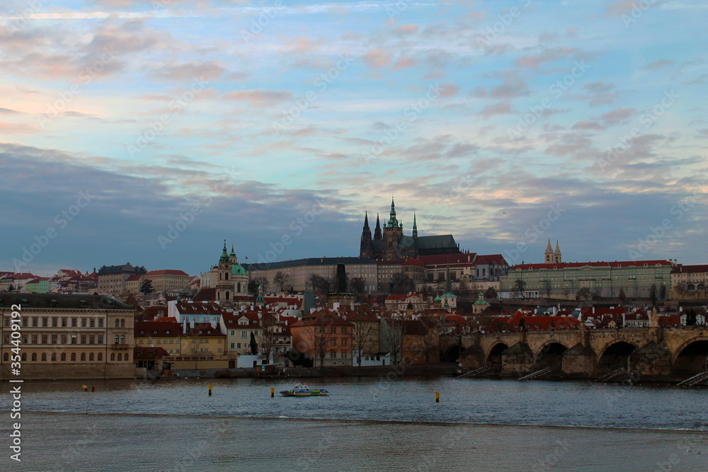 Postacard of the Historical city Prague, Czech Republic.
The photo was taken at sunset time and it show the most iconic monuments of this european city.