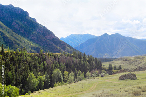 Wonderful mountain landscape with blue sky. Altai Republic  Russia. High green mountains and clean health air