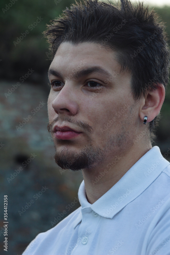 Fototapeta premium Portrait Of Young Man Looking At The Distance