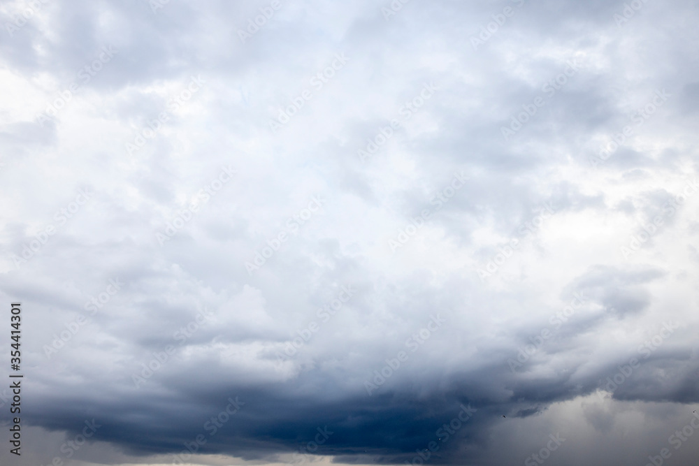 The background texture and dramatic sky with low clouds The background texture and dramatic sky with low clouds