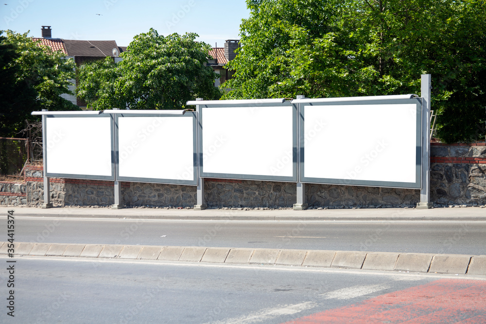 advertising board on asphalt road