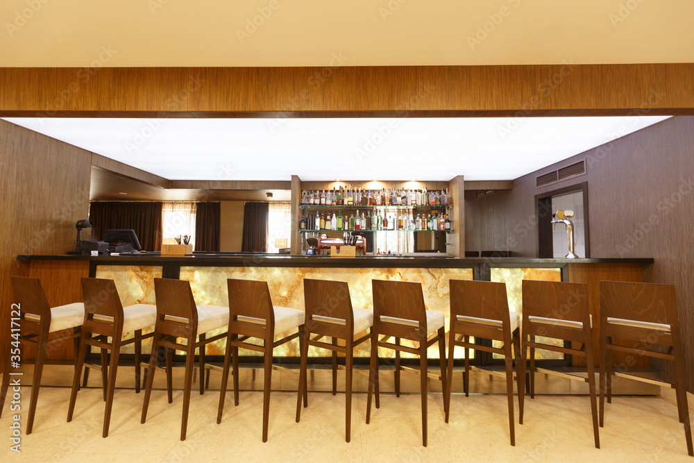 Bar for guests to hotel, with wooden walls