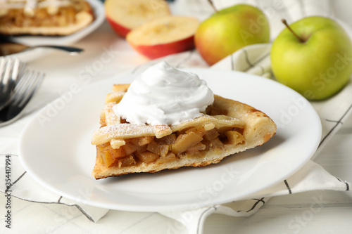 Composition with apple pie on white wooden background. Tasty lunch. Homemade breakfast