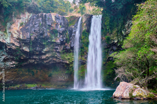 Cheonjiyeon waterfall falls one of tourist attractions of Jeju Island, South Korea