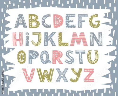 Cute colourful font in scandinavian style vector illustration. Hand drawn roman alphabet font flat style. Bright colored letters arranged in alphabetical order. Isolated on blue background