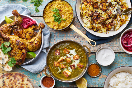 Indian cuisine dinner: tandoori chicken, biryani