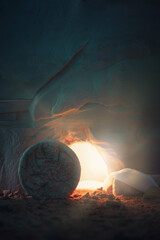Empty tomb of Jesus Christ with light. Born to Die, Born to Rise. "He is not here he is risen". Savior, Messiah, Redeemer, Gospel. Alive. Christian Easter concept. Jesus Christ resurrection. Miracle