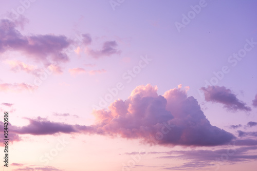 Fototapeta Naklejka Na Ścianę i Meble -  Soft purple clouds on sunset sky background. Pastel colored cloudscape. Pink clouds background