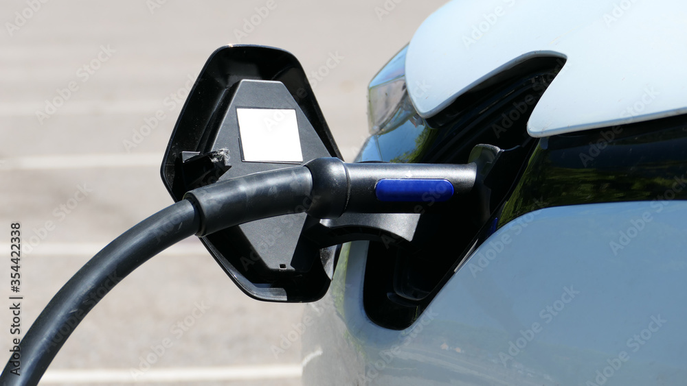 Detail of the front side of electric car charging