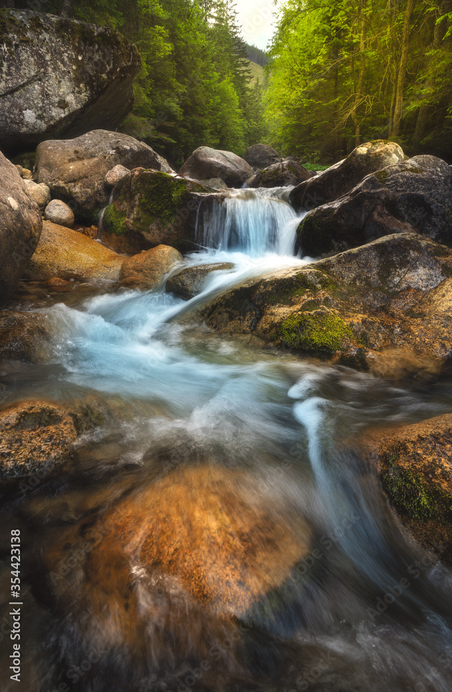 Beautiful nature with water flowing thourgh rocks near Zelene pleso (Green Lake) in High Tatras, Slovakia. Beautiful nature with water flowing thourgh rocks near Zelene pleso (Green Lake) in High Tatras, Slovakia.