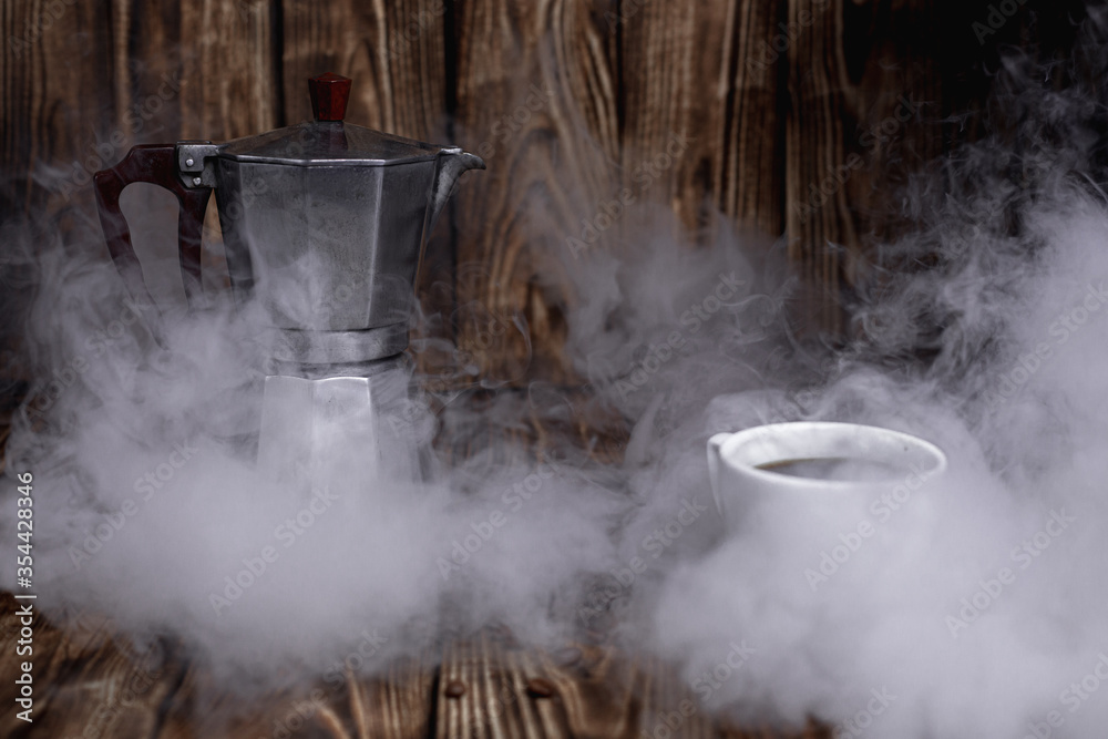 Steamed Moka pot with coffee beans on a dark wood table vintage photo Steamed Moka pot with coffee beans on a dark wood table vintage photo