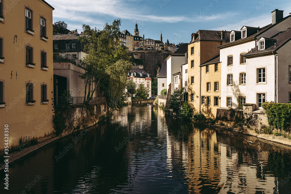 Alzette river crossing the historical old town of Luxembourg, called Grund