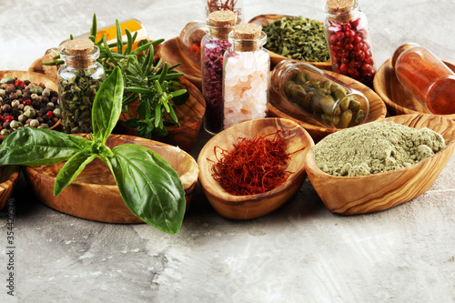 Spices and herbs on table. Food and organic cuisine ingredients.