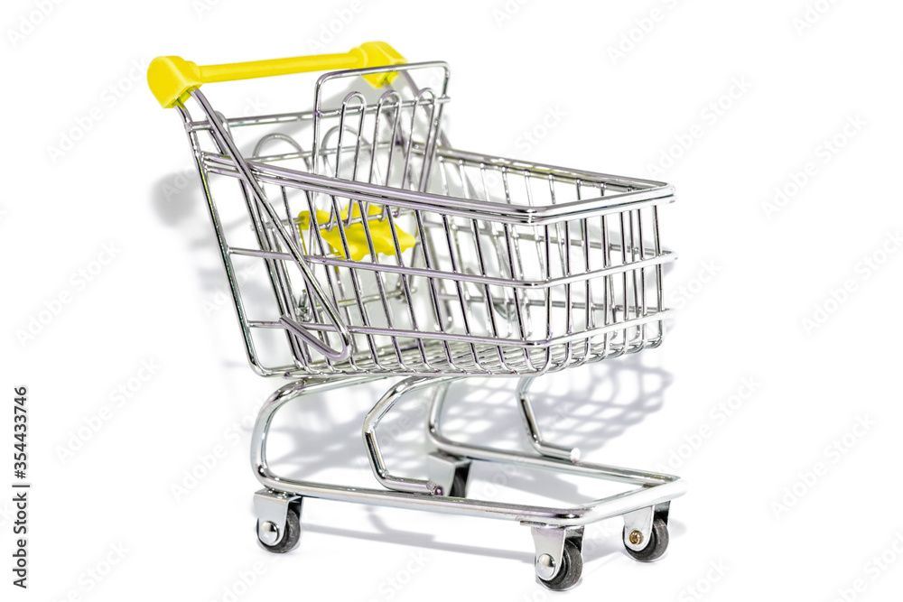 yellow shopping cart isolated. Internet shopping online concept. white background with copy space. yellow shopping cart isolated. Internet shopping online concept. white background with copy space.